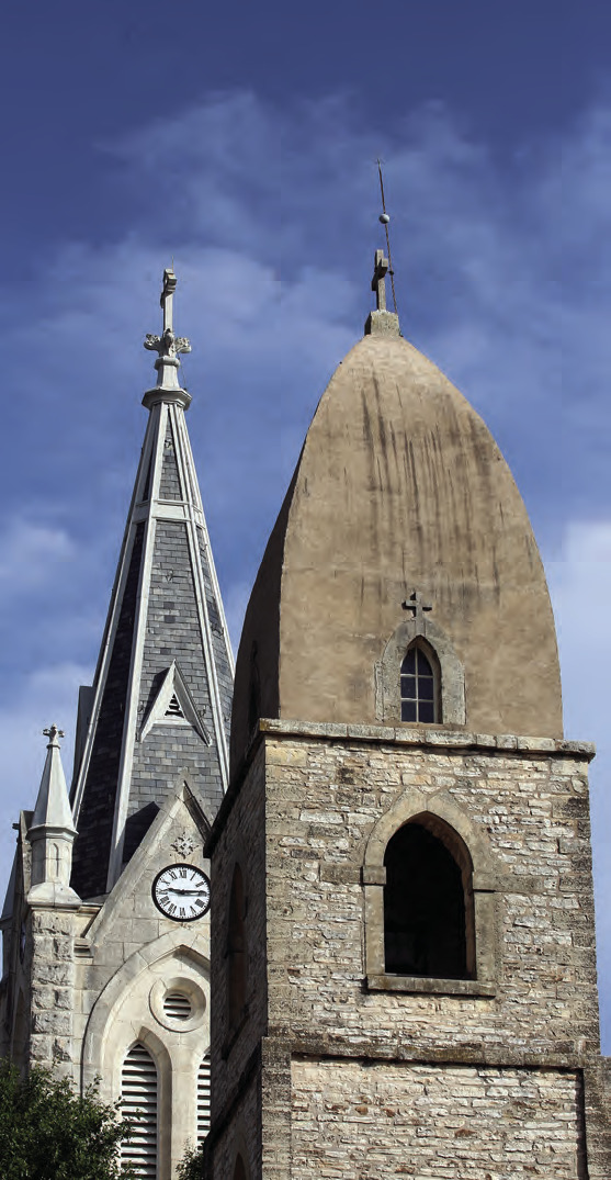 The steeples at St. Mary’s Catholic Church, one of which was the tallest, oldest structures in town, add to the skyline and familiar landmarks for this commmunity of faith. — Standard-Radio Post file