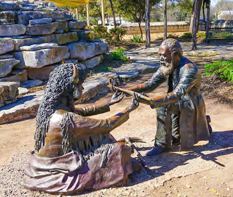 Bronze statue of John O. Meusebach and Chief Santanna sharing a peace pipe, can be found near the Martplatz Rose Garden and water wheel.
