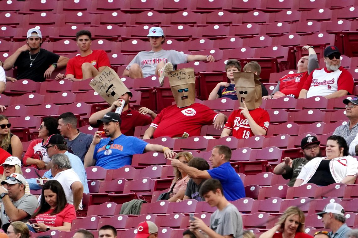 Break out the paper bags: Reds change mind about silencing fans
