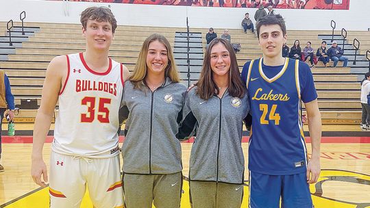 From left to right: Reece Hazelton, Maddie and Grace Bradford, and Xander Okerlund catch up after Ferris State and Lake Superior State played earlier this month. Photo courtesy of Don Miller