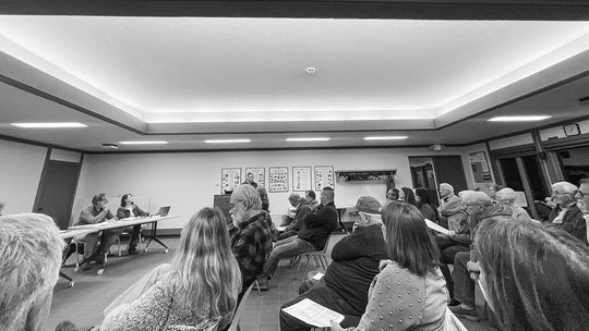 The Munnecke room at Leland Township Library was packed for the public hearing with Sunset Shores residents and neighbors both concerned and supportive of the proposed ongoing project that’s been years in the making. Enterprise photo by Meakalia Previch-Liu