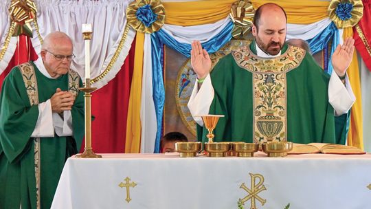 Father Michael Lingaur, a graduate of Lake Leelanau St. Mary, helped lead a Polish heritage Mass held Sunday during the Polka Fest. Photo courtesy of James Frick