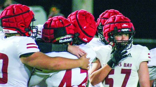 Suttons Bay teammates hug after their last game against Mesick earlier this month. Photo courtesy of Cynthia Opie