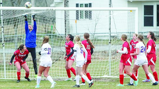 Suttons Bay goalkeeper Keely TwoCrow makes a save against Leland earlier this month. Enterprise photo by Brian Freiberger