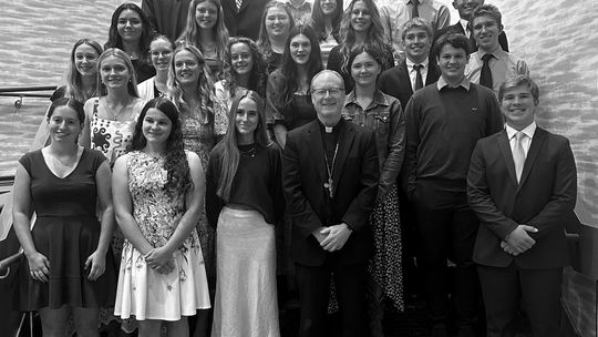 The St. Mary School chapter of Teens for Life, recently attended the Focus on Life Annual Benefit Dinner at the Grand Traverse Resort. Students pose with Bishop Jeffrey Walsh from the Diocese of Gaylord during the event.