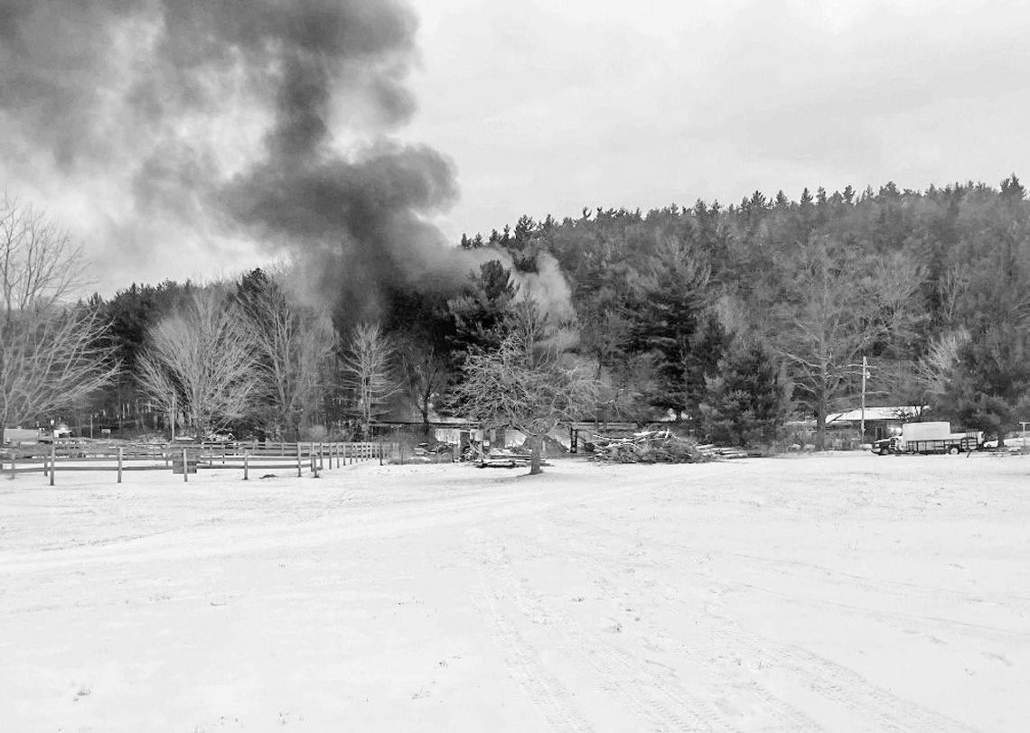 The maintenance barn at Camp Leelanau was destroyed by a fire Monday. Courtesy photo from Ken Fritz
