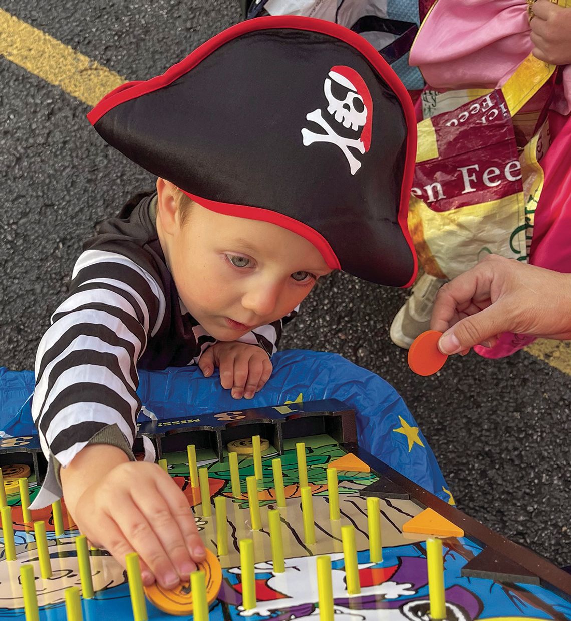Charlie Drow dressed as a pirate for Lake Leelanau St. Mary trunk-ortreat event Friday. Enterprise photo by Mike Anderson