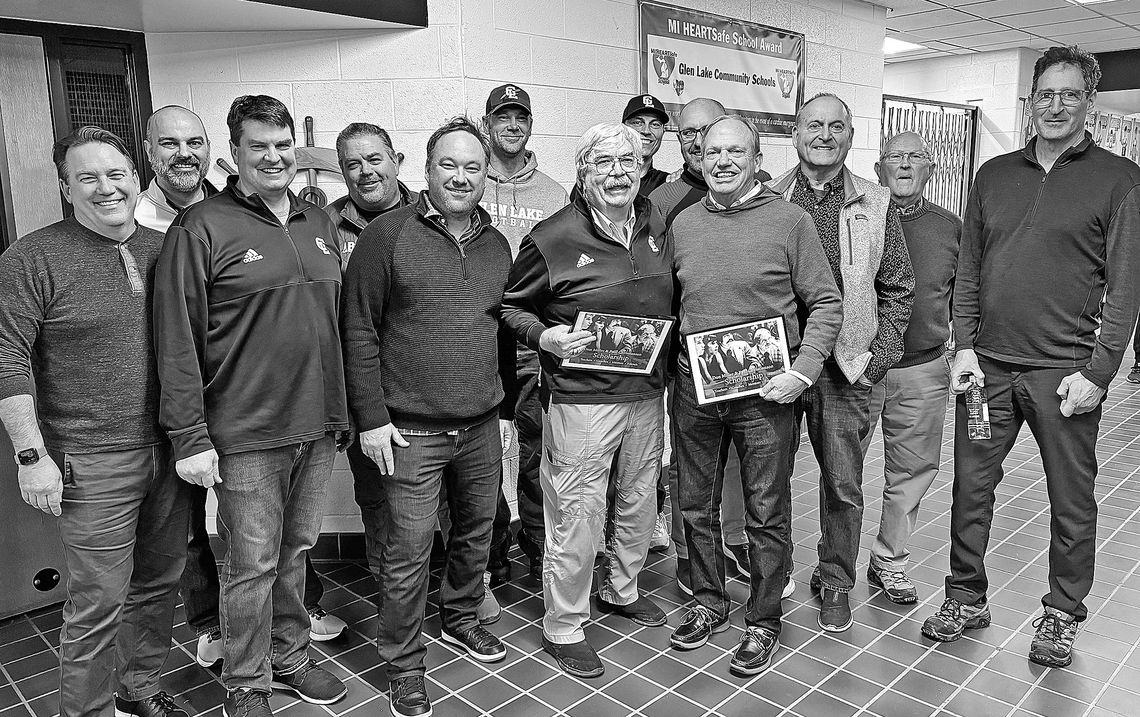 From left to right: Jason Homa (92’), Darick Peplinski (96’), Brad Fosmore (88’). John Zientek (87’), Todd Ciolek (95), Greg Rosinski (99’), Coach Don Miller, Ben LaCross (97’), Coach Paul Christiansen, Todd Hazelton hidden (88’), Keith Shimek (74’), Tom Christiansen, and Bob Sutherland (8...