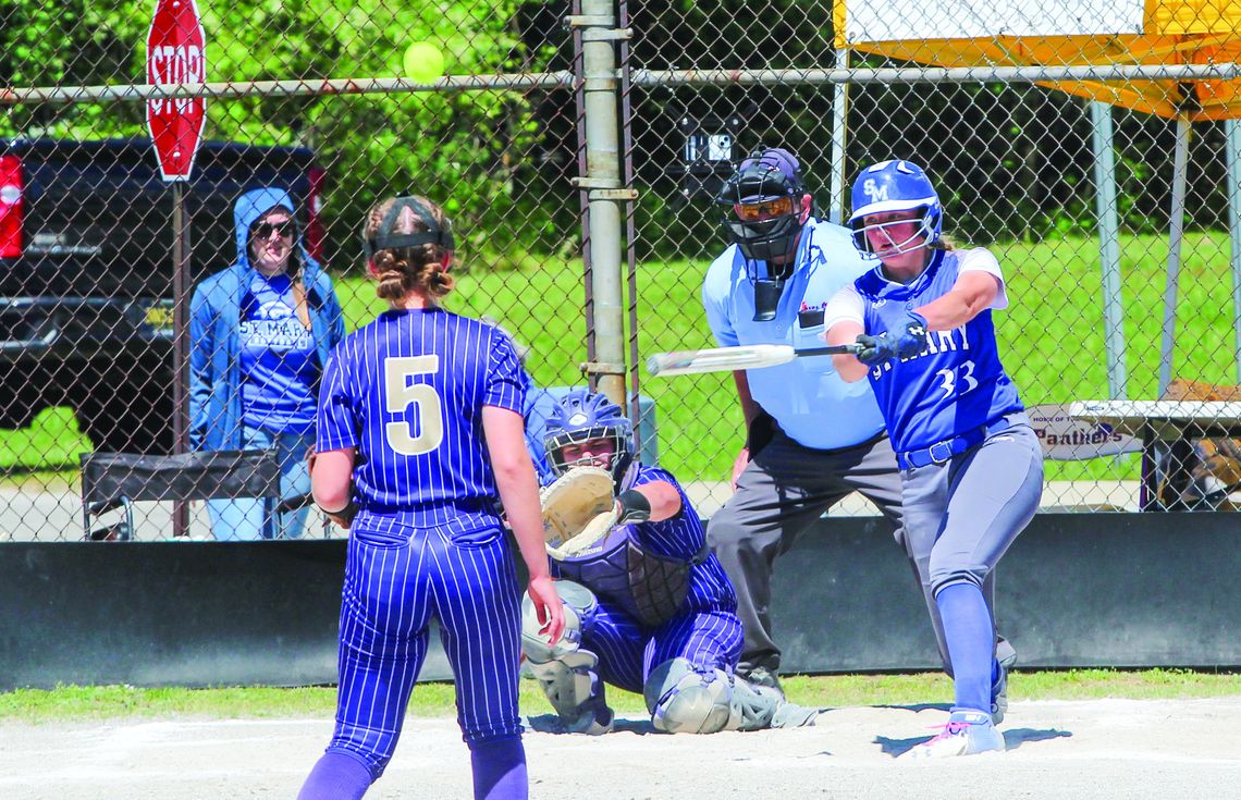 Lake Leelanau St. Mary senior Leah Fleis drill a 2-run home run over centerfield during a MHSAA Div. 4 regional softball game at Frankfort on Saturday. Enterprise photo by Brian Freiberger
