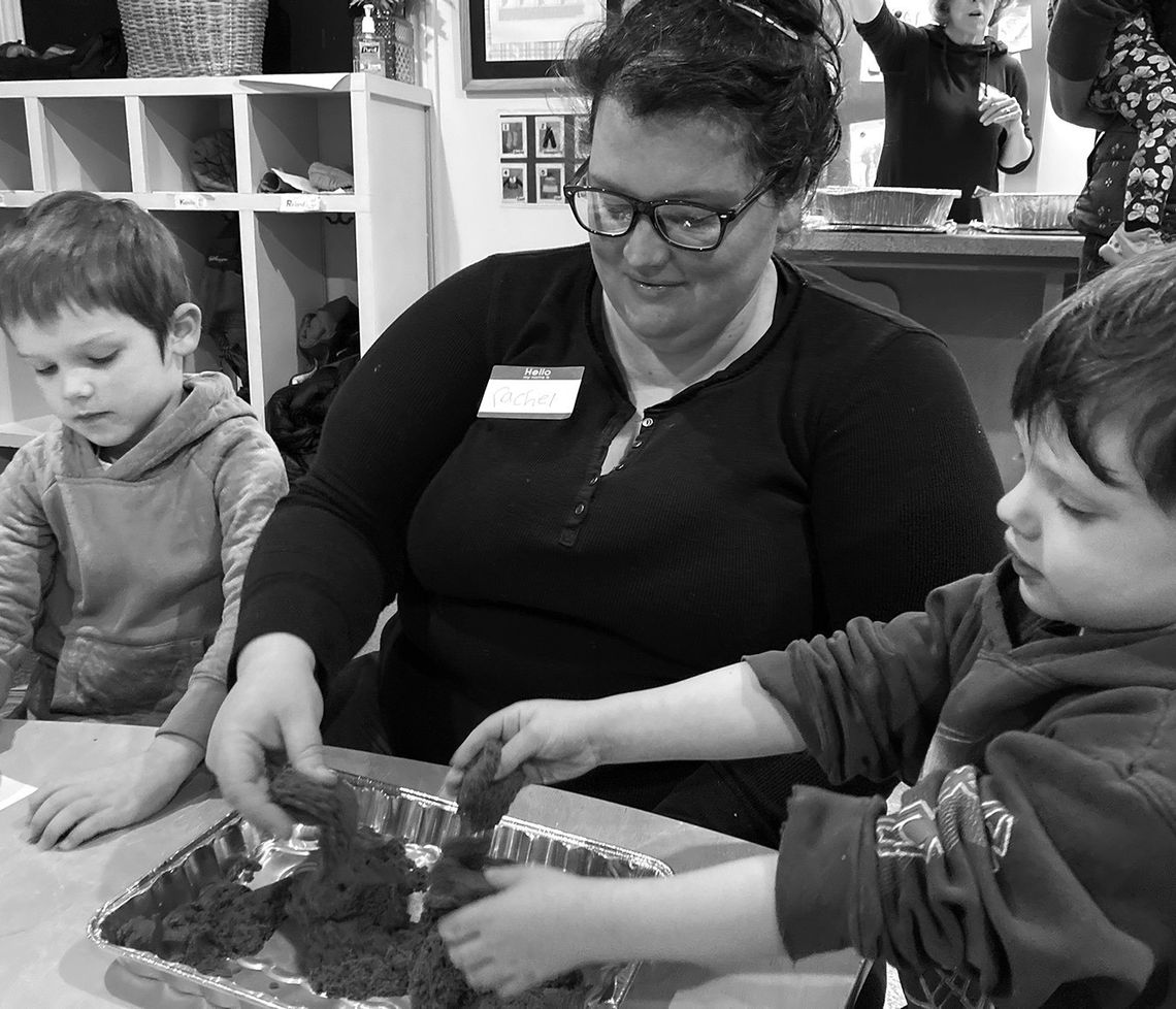 A Leelanau County family is pictured together during an activity in a previous Parenting Communties’ Families Together session. Courtesy photo