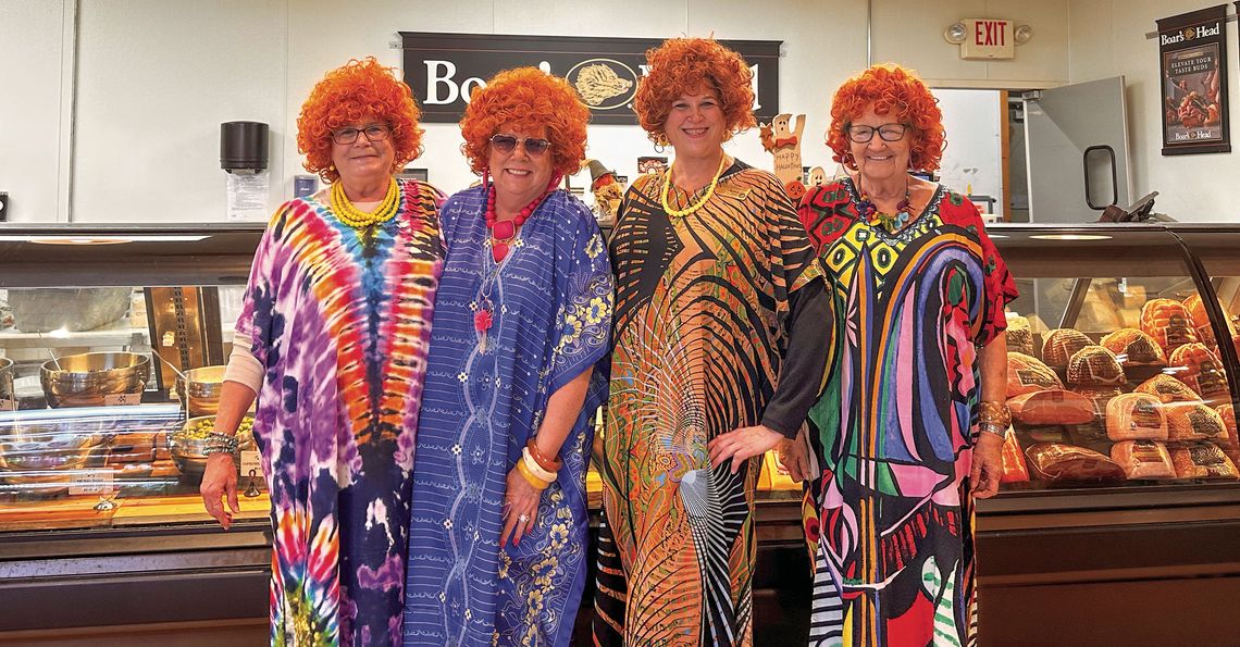 Friends and co-workers at Hansen Foods dressed up like Mrs. Roper from the 1970s sitcom “Threes Company.” Enterprise photo by Amy Hubbell