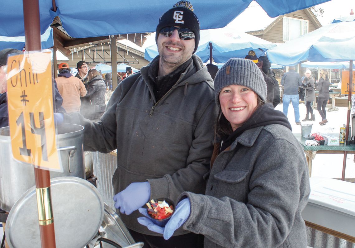 Glen Lake Community Schools food service professionals Jonathon Fields and Mindy Hawley won the 25th annual Winterfest chili cook off hosted by Boonedocks in Glen Arbor on Saturday. Over 800 people attended the event this year. Enterprise photo by Brian Freiberger