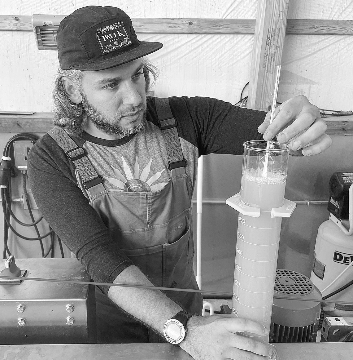 Harvest report: One of the best Septembers in a decade Two K Farms winemaker Kurt Barry measures the brixs levels in freshly pressed apples earlier this week. Enterprise photo by Brian Freiberger