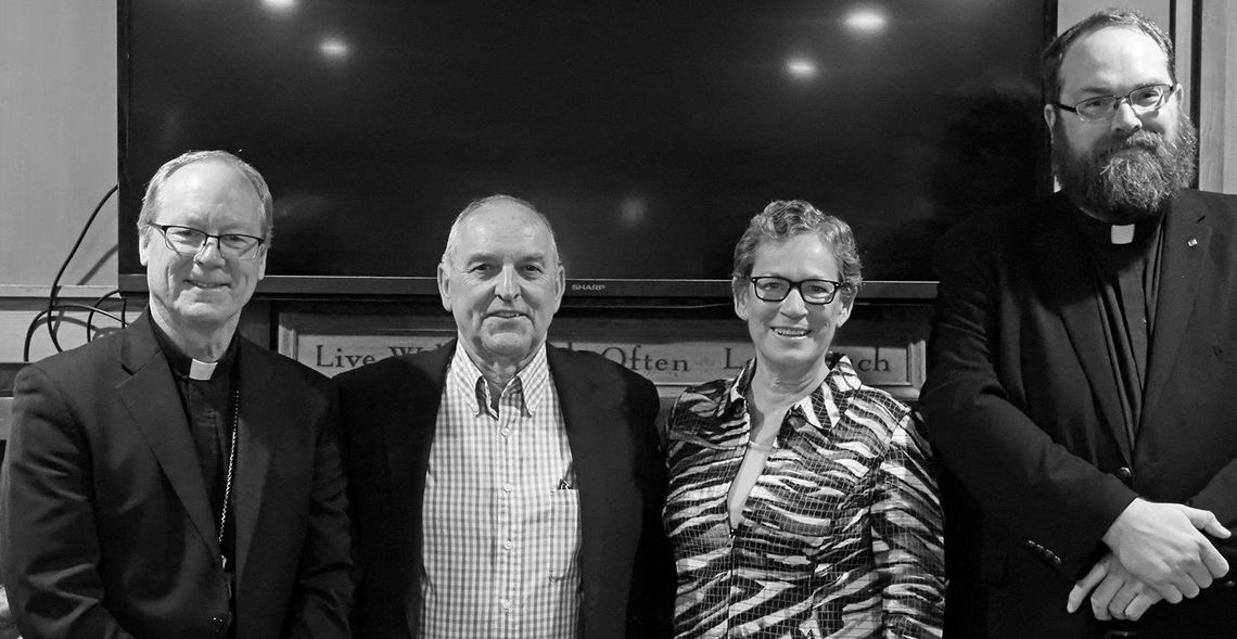 St. Mary School Benefactor of the Year Award went to Larry and Jackie Fleis. They are shown here flanked by Bishop Jeffery Walsh, left and the Rev. Ben Martin. Courtesy photo