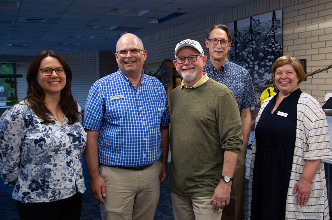 Author William Kent Krueger was brought to the county by local libraries and their supporters. Pictured, from left, are Julie Preneta, director, Leelanau Township Public Library; Mark Morton, director, Leland Township Public Library; author William Kent Krueger; David Diller, director, Gle...