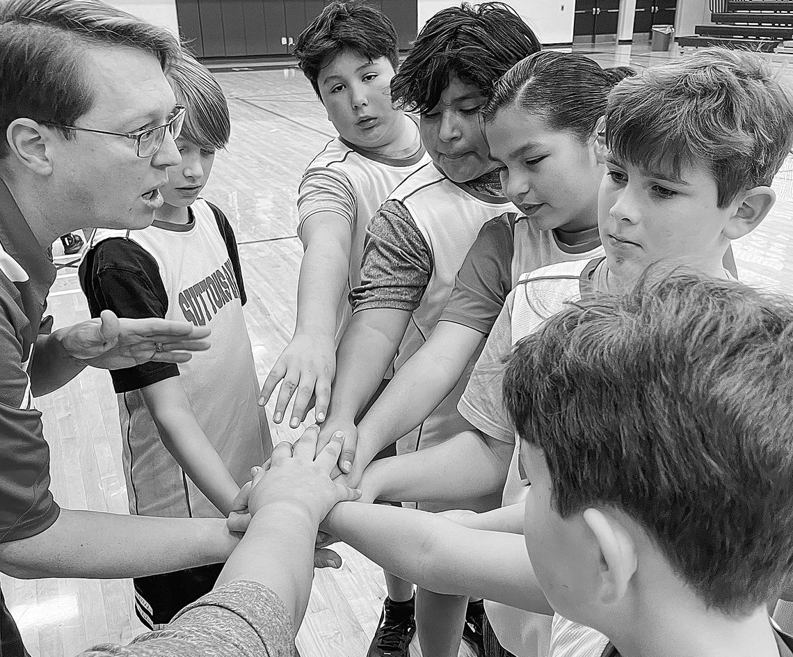 Trevor Bunek, who coaches 5th graders at Suttons Bay Public School, is seen at a recent practice with students that will participate in the upcoming inaugural Strongheart Boys Invitational. Photo courtesy of Joseph Symons