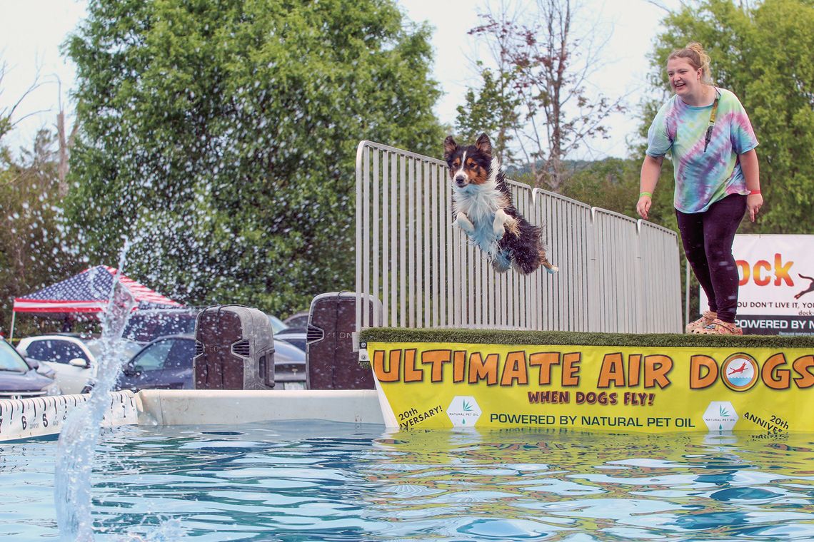 Jen Stephens and her dog Kash competed at the Ultimate Air Dogs competition at the Cedar Polka Fest on Saturday and Sunday. Kash had a jump of 19 feet 10 inches in the final. Enterprise photo by Brian Freiberger