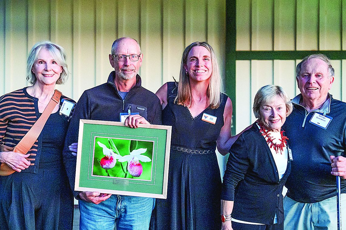 Kelly recognized with TART Mudgett award Kerry Kelly was named the winner of TART Trails 2024 Jim Mudgett Trail Pioneer Award. Pictured from left are his wife, Kathy Kelly; Kelly; Julie Clark from TART Trails; Carol Quarderer and Friends of Sleeping Bear board member George Quarderer. Courtesy photo