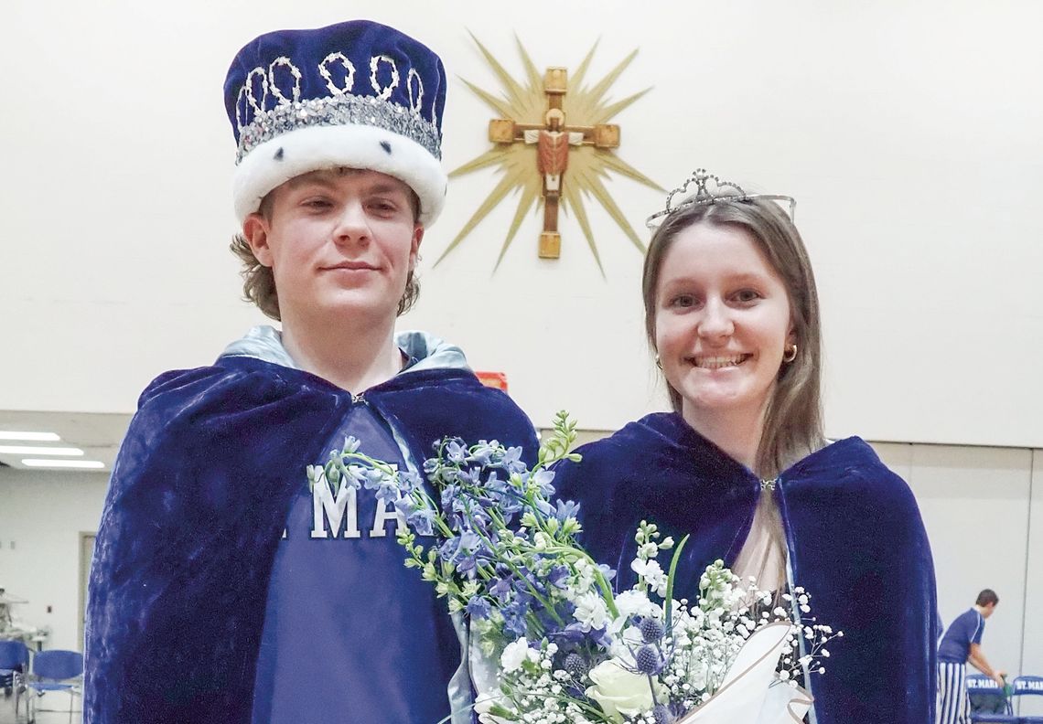 Lake Leelanau St. Mary senior Eli Kelenske (left) Sarah Bunek (right) became royalty during the boys basketball game against TC Christian on Friday as they were named winter homecoming king and queen. Courtesy photo