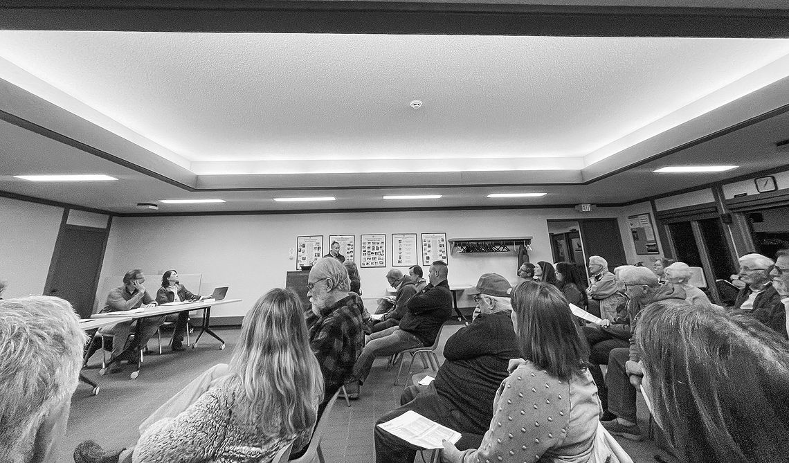The Munnecke room at Leland Township Library was packed for the public hearing with Sunset Shores residents and neighbors both concerned and supportive of the proposed ongoing project that’s been years in the making. Enterprise photo by Meakalia Previch-Liu