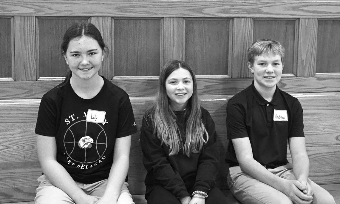 Lily Herman, an eighth graders was first in the St. Mary School annual spelling bee. Also picture from left is fifth grader Kayleigh Harnick and eighth grader Andrew Grant, alternate. Courtesy photo