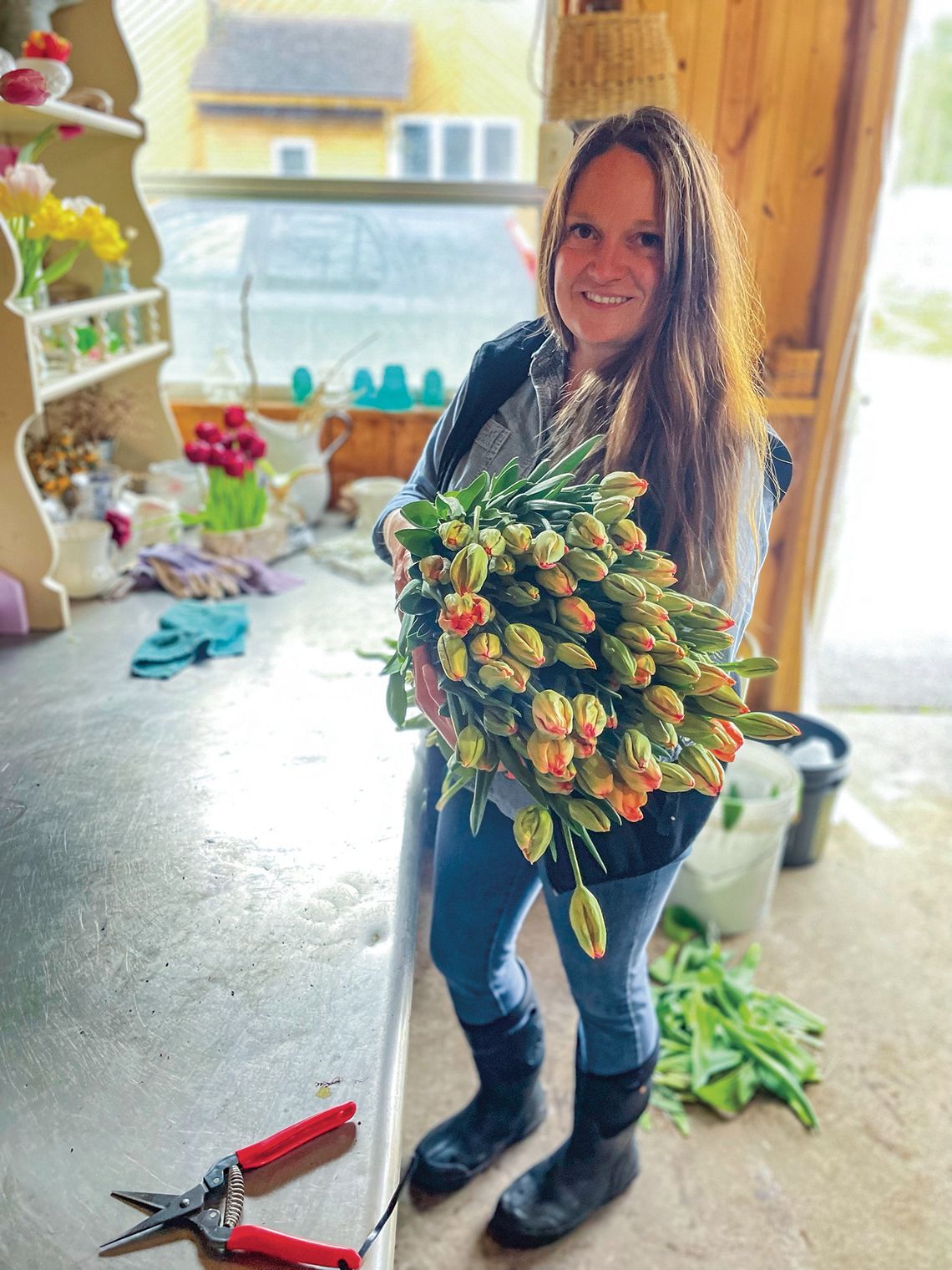 Michelle Shackelford, owner of Leelanau Specialty Cut Flowers in Cedar, is ramping up for a busy spring, summer, and fall as she begins to harvest flowers from early May until Christmas. Enterprise photo by Brian Freiberger