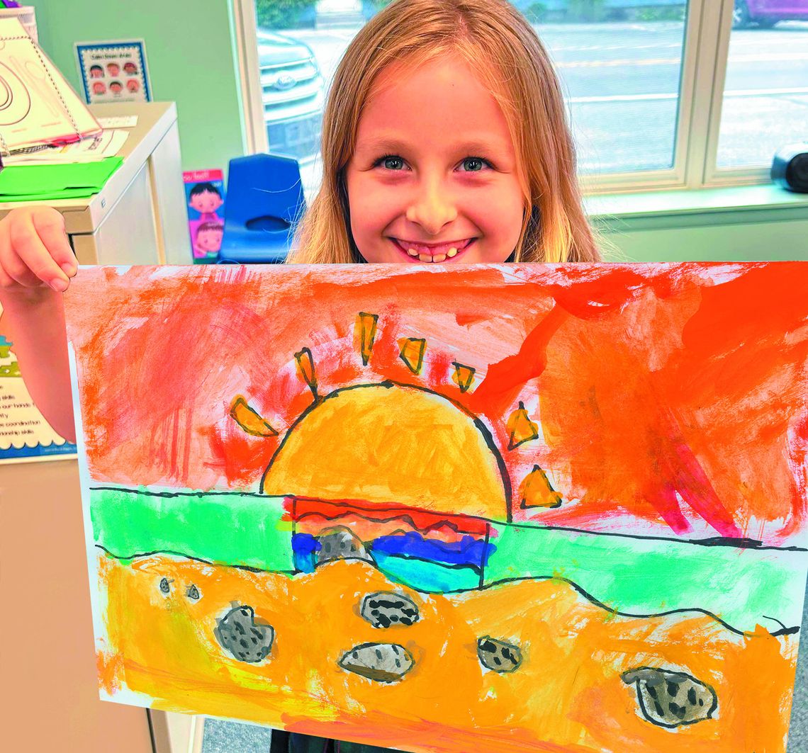 Iris Wild, a second grader at St. Mary, is a Grand Traverse Area Rock and Mineral Club pebble pup. Enterprise photo by Mike Anderson