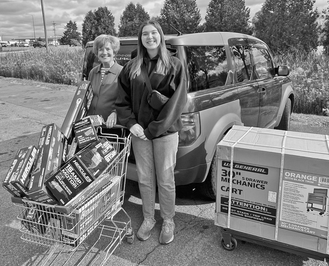 Riley Brown, a recent Glen Lake graduate, purchased $2,000 of mechanics tools with a scholarship from the Glen Lake Woman’s Club. She is pictured here with scholarship committee member Ginna Woessner. Courtesy photo