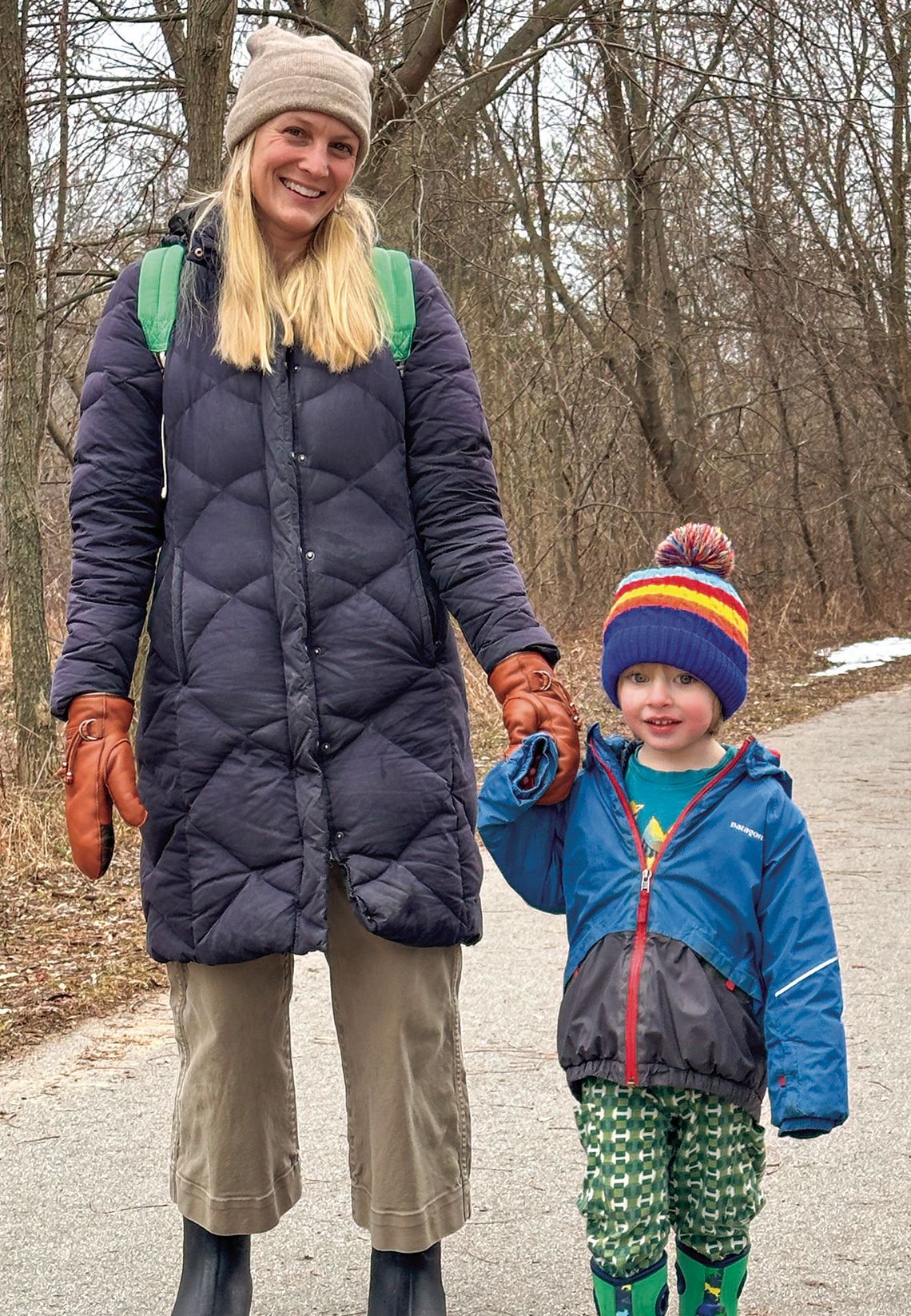 Tracy Smedes-Hepler and her friend, Luca, 3, enjoyed some fresh air and exercise Tuesday, walking on the Leelanau Trail in Suttons Bay. Enterprise photo by Amy Hubbell