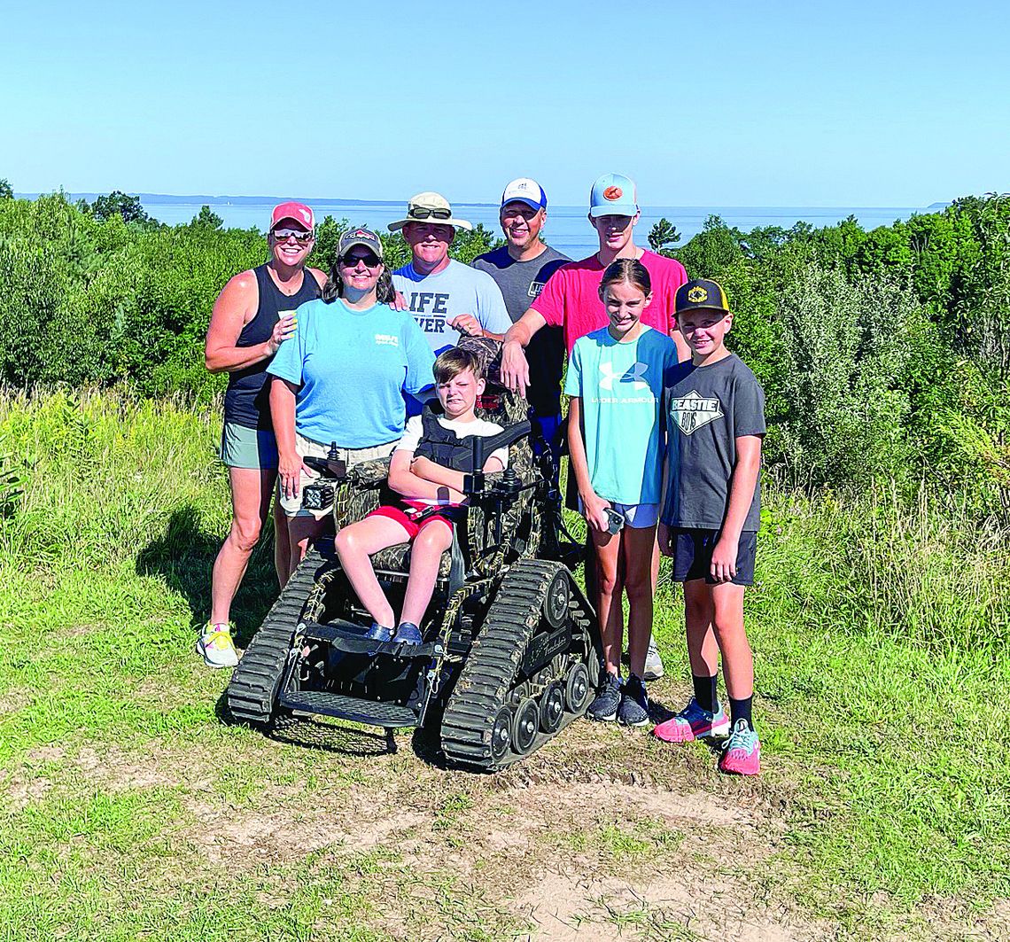 Members of this family can explore Sleeping Bear Dunes National Lakeshore as one group thanks to the Friends of Sleeping Bear. Courtesy photo