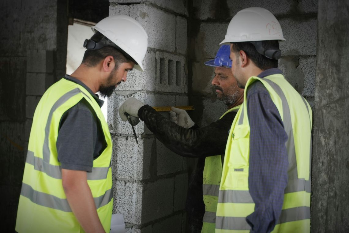 Find The Best Home Builders In California | Hamro Construction LLC a couple of men standing next to each other